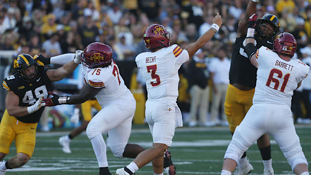 Rocco Becht passing the ball for a touchdown.