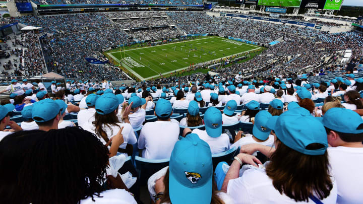 Fans in the east stands watch the opening kickoff of Sunday's Jaguars game against the Raiders.