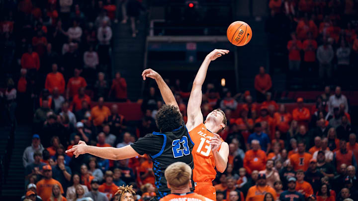 Illinois center Tomislav Ivisic (13) battles for the ball in Monday's Illini home opener against Eastern Illinois at the State Farm Center in Champaign, Illinois. Illinois center Tomislav Ivisic (13) battles for the ball in Monday's Illini home opener against Eastern Illinois at the State Farm Center in Champaign, Illinois.
