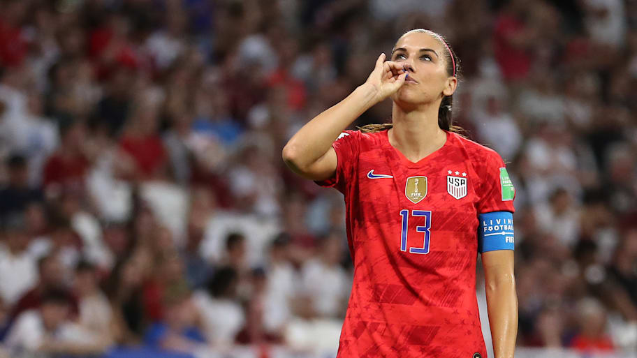 Alex Morgan celebrated her eventual game-winner in iconic fashion in the 2019 Women's World Cup semifinals. | Catherine Ivill/FIFA/Getty Images