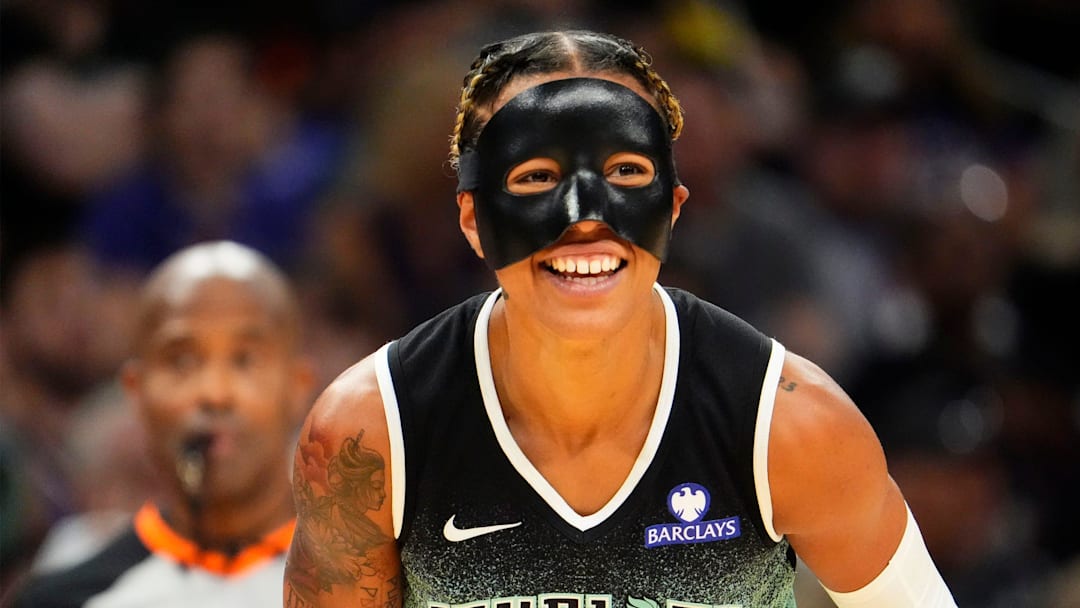 New York Liberty guard Natasha Cloud (9) smiles during action against the Phoenix Mercury in the first half of Game One of the 2025 WNBA Playoffs first round at PHX Arena on Sept. 14, 2025.