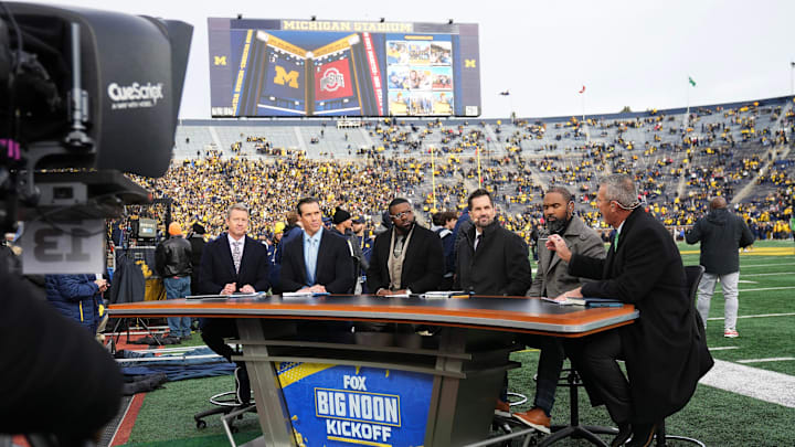 Nov 25, 2023; Ann Arbor, Michigan, USA; Former Ohio State head coach Urban Meyer talks on the sideline set of Fox Big Noon Kickoff prior to the NCAA football game between the Michigan Wolverines and the Ohio State Buckeyes at Michigan Stadium.