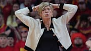 Iowa Hawkeyes women' basketball head coach Jan Jensen reacts during the second quarter against Iowa State in the NCAA women’s basketball Cy-Hawk Series on Dec. 10, 2025, at Hilton Coliseum in Ames, Iowa.