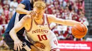 Indiana's Luke Goode ((10) drives past Penn State's Zach Hicks (24) during the Indiana versus Penn St. mens basketball game at Simon Skjodt Assembly Hall on Wednesday, Feb. 26, 2025.