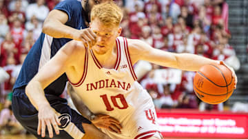 Indiana's Luke Goode ((10) drives past Penn State's Zach Hicks (24) during the Indiana versus Penn St. mens basketball game at Simon Skjodt Assembly Hall on Wednesday, Feb. 26, 2025.