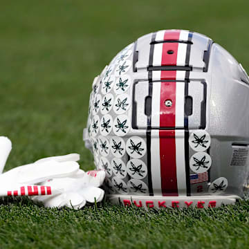 Ohio State Buckeyes helmet and gloves.
