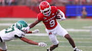 Sep 10, 2022; Piscataway, New Jersey, USA; Rutgers Scarlet Knights wide receiver Chris Long (9) runs with the ball against the Wagner Seahawks during the second half at SHI Stadium. Mandatory Credit: Ed Mulholland-Imagn Images