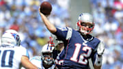 New England Patriots quarterback Tom Brady (12) throws a touchdown pass over the Tennessee Titans defense at LP Field in Nashville on Sept. 9, 2012. The Titans lost their home and season opener 34-13.