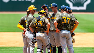 West Virginia Head Coach Steve Sabins visits the mound as The LSU Tigers take on the West Virginia Mountaineers in Game 1 of the 2025 NCAA Division 1 Super Regional Baseball Championship at Alex Box Stadium in Baton Rouge, LA. Saturday, June 7, 2025.