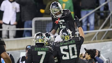 Nov 30, 2024; Eugene, Oregon, USA; Oregon Ducks wide receiver Tez Johnson (15) celebrates catching a touchdown pass during the second half against the Washington Huskies at Autzen Stadium. Mandatory Credit: Troy Wayrynen-Imagn Images