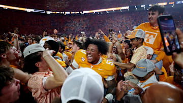 Oct 19, 2024; Knoxville, Tennessee, USA; Tennessee Volunteers defensive lineman Daevin Hobbs (53) celebrates with fans after defeating the Alabama Crimson Tide at Neyland Stadium. Mandatory Credit: Alan Poizner-Imagn Images