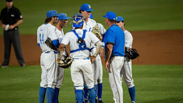 UCLA Bruins team huddles during a break in the action as Auburn Tigers take on UCLA Bruins during the NCAA regional baseball tournament at Plainsman Park in Auburn, Ala., on Sunday, June 5, 2022.