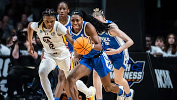 Duke Blue Devils guard Oluchi Okananwa (5) dribbles the ball down the court, pursued by South Carolina Gamecocks guard MiLaysia Fulwiley (12).