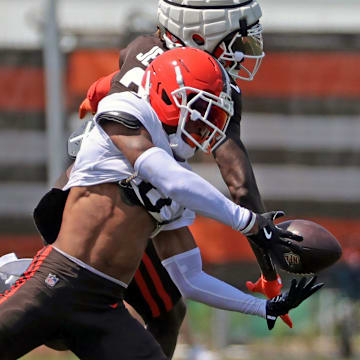 Cleveland Browns cornerback Greg Newsome II (0) nearly picks off a pass intended for wide receiver Jerry Jeudy (3) during NFL training camp at CrossCountry Mortgage Campus, Friday, Aug. 1, 2025, in Berea, Ohio.
