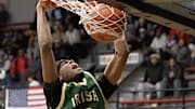 St.Vincent-St. Mary’s Elijah Chapman dunks during their game against McKinley on Tuesday, Dec. 2, 2025. Bob Rossiter / Special To The Canton Repository
