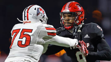 Imhotep Charter's Zahir Mathis looks to make a play in the PIAA Class 5A state championship game against Peters Township.