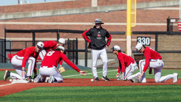 Louisville baseball coach Dan McDonnell looked on during team drills at Jim Patterson Stadium on Tuesday, Feb. 13, 2024.