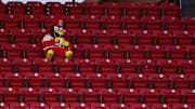 Sep 26, 2020; St. Louis, Missouri, USA;  St. Louis Cardinals mascot Fredbird attempts to solve a rubik s cube during the third inning of a game against the Milwaukee Brewers at Busch Stadium. Mandatory Credit: Jeff Curry-Imagn Images