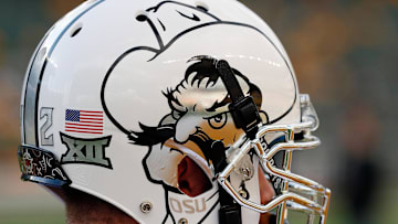 Sep 24, 2016; Waco, TX, USA; The Oklahoma State Cowboy logo on a helmet prior to a game against the Baylor Bears at McLane Stadium. Baylor won 35-24. Mandatory Credit: Ray Carlin-Imagn Images