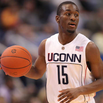 Nov 4, 2009; Hartford, CT, USA; Connecticut Huskies guard Kemba Walker (15) returns the ball up court as they take on the American International Yellow Jackets in the second half during an exhibition game at the XL Center. UConn defeated the Yellow Jackets 106-67. Mandatory Credit: David Butler II-Imagn Images