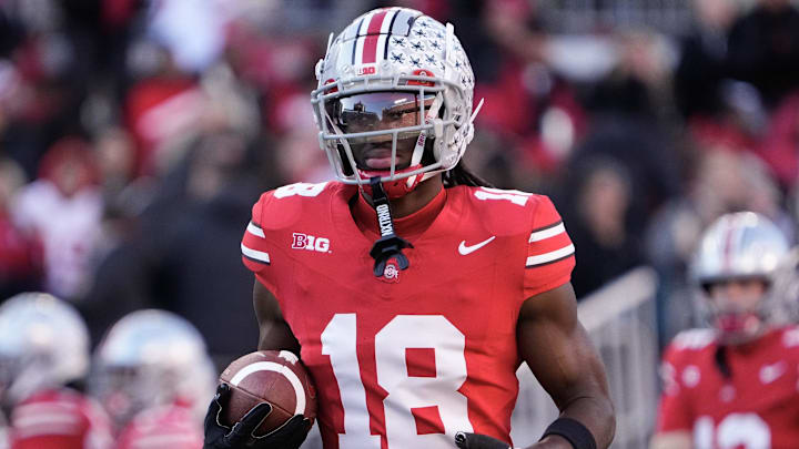 Nov 18, 2023; Columbus, Ohio, USA; Ohio State Buckeyes wide receiver Marvin Harrison Jr. (18) warms