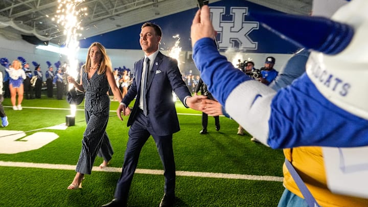 New Kentucky Wildcat head coach Will Stein arrives with wife, Darby has he is introduced at Kentucky on Wednesday, December 3, 2025