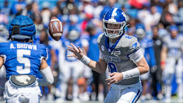 Kentucky freshman quarterback Cutter Boley (8) tossed the ball to Anthony Brown-Stephens (5) during the Kentucky Wildcats' Blue White scrimmage at Kroger Field on Saturday afternoon in Lexington, Kentucky. April 13, 2024