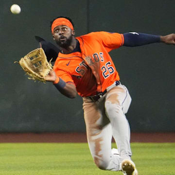 Houston Astros center fielder Taylor Trammell catches a line drive off the bat of Arizona Diamondbacks Josh Naylor in the fourth inning at Chase Field in Phoenix on July 23, 2025.