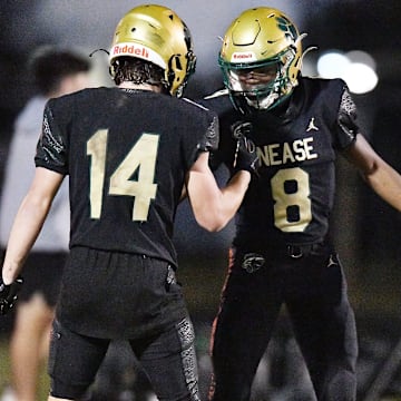 Nease Panthers Emmanuel Williams (8) celebrates with teammate Maddox Spencer (14) after Williams pulled in an open field pass that he ran in for a touchdown early in the fourth quarter. The Niceville Eagles traveled to Nease High School in St. Johns County for the FHSAA Region 1-4S high school football playoff game Friday, November 10, 2023. The Eagles led 35 to 7 at the half and came away with a 55 to 21 victory over the Panthers.