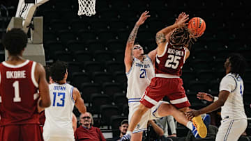 Jeremy Dent-Smith, 25, of Stanford shoots over Robbie Avila, 21, of St. Louis University in the Acrisure Invitational Champioship game at Acrisure Arena in Palm Desert, Calif., Nov. 28, 2025.