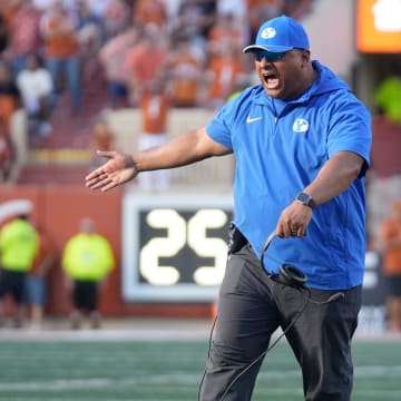 BYU Cougars head coach Kalani Sitake celebrates after the Cougars stopped the Texas Longhorns in the red zone in the fourth quarter at Royal-Memorial Stadium on Saturday October 28, 2023.