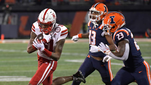 Nebraska Cornhuskers defensive back Tommi Hill (31) runs with the ball after making an interception during the second half ag