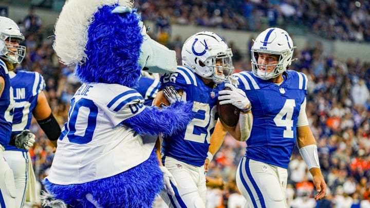 Indianapolis Colts running back Evan Hull (26) celebrates in the end zone with teammates during a pre-season game between the Indianapolis Colts and the Denver Broncos on Sunday, August. 11, 2024 at Lucas Oil Stadium in Indianapolis.