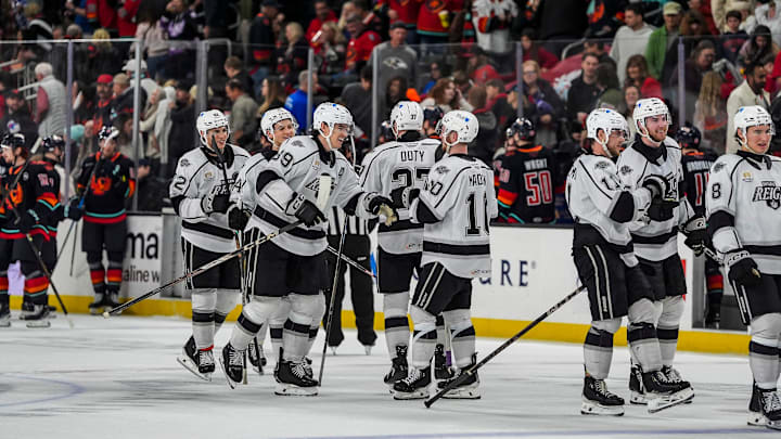 Ontario Reign players celebrate a win over the Coachella Valley Firebirds after a shootout at Acrisure Arena in Palm Desert, Calif., Saturday, Dec. 28, 2024.