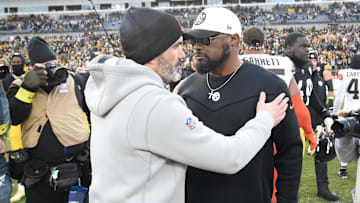 Jan 8, 2023; Pittsburgh, Pennsylvania, USA;  Cleveland Browns head coach Kevin Stefanski (left) meets with Pittsburgh Steelers head coach Mike Tomlin after a Steelers 28-14 win at Acrisure Stadium.