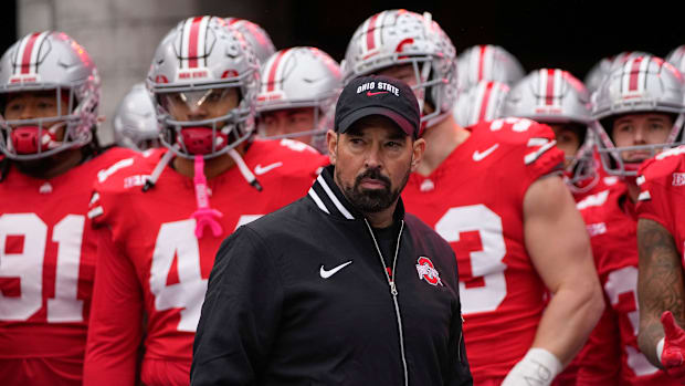 Ohio State Buckeyes head coach Ryan Day leads his team onto the field during the NCAA football game vs. the Indiana Hoosier