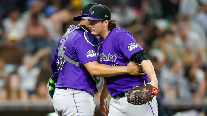 Aug 2, 2024; San Diego, California, USA; Colorado Rockies relief pitcher Victor Vodnik (38) celebrates with Colorado Rockies catcher Elias Diaz (35) after defeating the San Diego Padres 5 to 2 at Petco Park. Mandatory Credit: David Frerker-USA TODAY Sports