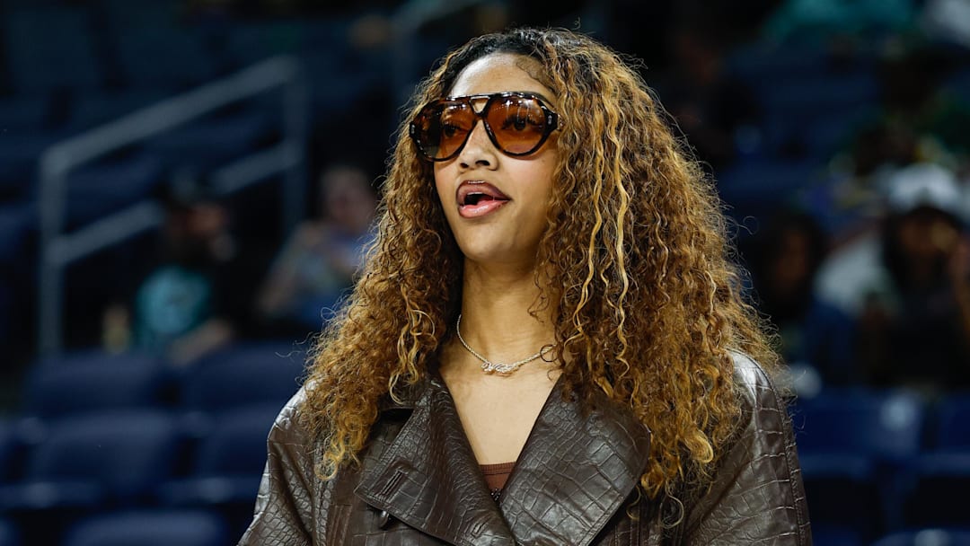 Sep 11, 2025; Chicago, Illinois, USA; Injured Chicago Sky forward Angel Reese (5) stands on the sidelines before a WNBA game against the New York Liberty at Wintrust Arena. Mandatory Credit: Kamil Krzaczynski-Imagn Images