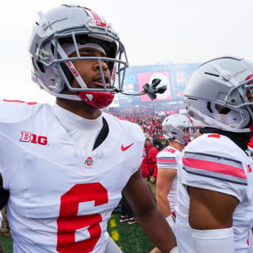 Nov 4, 2023; Piscataway, New Jersey, USA; Ohio State Buckeyes safety Sonny Styles (6) and cornerback Davison Igbinosun (1) take the field prior to the NCAA football game against the Rutgers Scarlet Knights at SHI Stadium. Ohio State won 35-16.