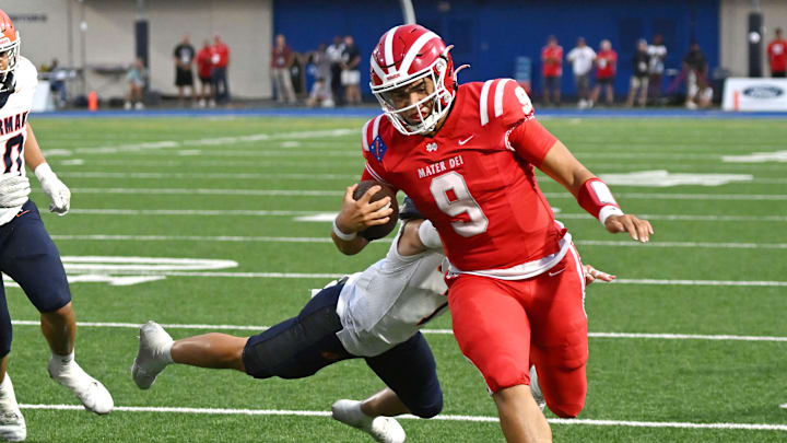 Mater Dei QB Ashton Beierly rushes for a gain against Bishop Gorman on September 6, 2023. 