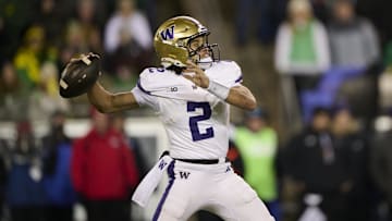 Nov 30, 2024; Eugene, Oregon, USA; Washington Huskies quarterback Demond Williams Jr. (2) throws a pass during the first half against the Oregon Ducks at Autzen Stadium. Mandatory Credit: Troy Wayrynen-Imagn Images