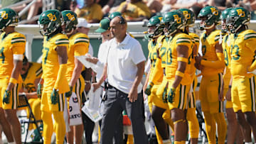 Oct 4, 2025; Waco, Texas, USA; Baylor Bears head coach Dave Aranda watches game play from the sideline against the Kansas State Wildcats during the first half at McLane Stadium. Mandatory Credit: Chris Jones-Imagn Images