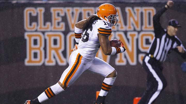 Dec 4, 2011; Cleveland, OH, USA; Cleveland Browns wide receiver Josh Cribbs (16) runs the ball against the Baltimore Ravens at Cleveland Browns Stadium. Mandatory Credit: Rick Osentoski-Imagn Images