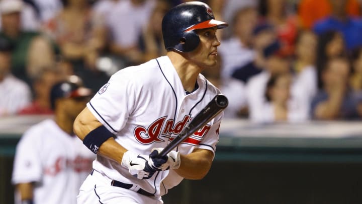 July 6, 2011; Cleveland, OH, USA; Cleveland Indians center fielder Grady Sizemore (24) hits a sacrifice fly during the eighth inning against the New York Yankees at Progressive Field. Mandatory Credit: Rick Osentoski-USA TODAY Sports