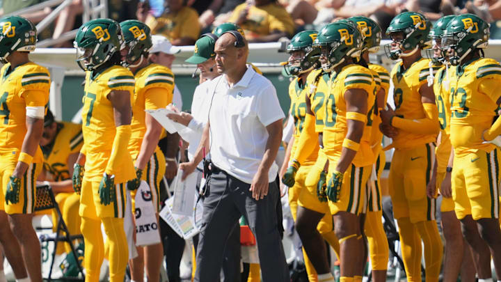 Oct 4, 2025; Waco, Texas, USA; Baylor Bears head coach Dave Aranda watches game play from the sideline against the Kansas State Wildcats during the first half at McLane Stadium. Mandatory Credit: Chris Jones-Imagn Images