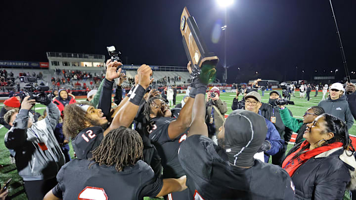 Imhotep Charter football players celebrate winning the 2023 PIAA Class 5A state championship over Peters Township. Imhotep Charter football players celebrate winning the 2023 PIAA Class 5A state championship over Peters Township.