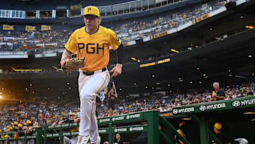 Pittsburgh Pirates outfielder Jack Suwinski takes the field against the Athletics.