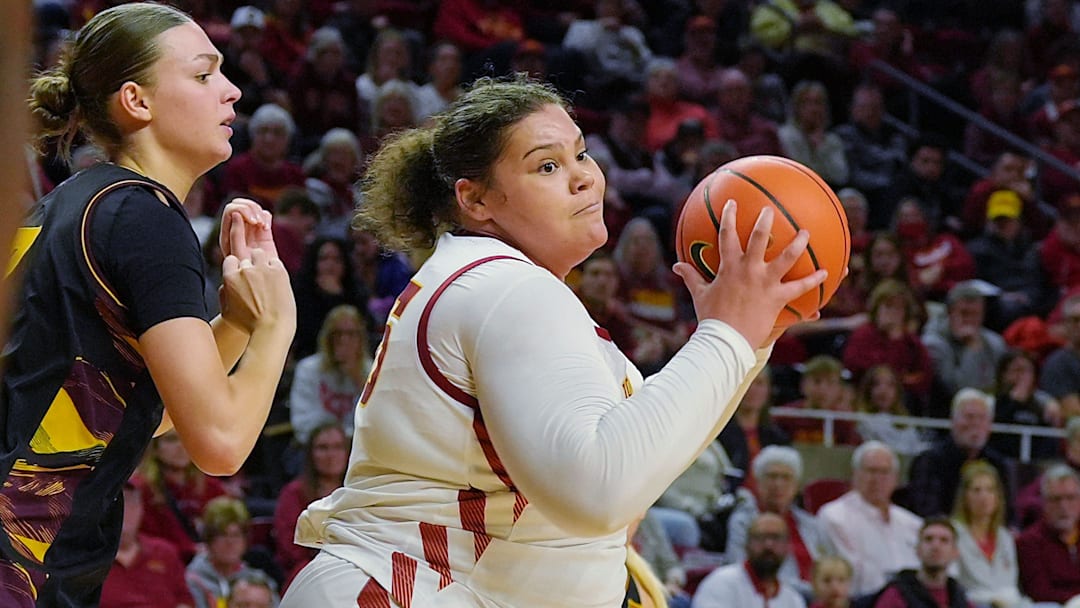 Iowa State Cyclones' center Audi Crooks (55) drives to the basket around Arizona State Sun Devils center Martina Fantini (7) during the second quarter in the Big-12 women’s basketball at Hilton Coliseum on Feb. 18, 2026, in Ames, Iowa Iowa State Cyclones' center Audi Crooks (55) drives to the basket around Arizona State Sun Devils center Martina Fantini (7) during the second quarter in the Big-12 women’s basketball at Hilton Coliseum on Feb. 18, 2026, in Ames, Iowa