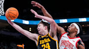 Iowa's Pryce Sandfort goes up for a basket Wednesday against Ohio State's Micah Parrish.