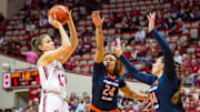 Indiana's Yarden Garzon (12) shoots over Illinois' Adalia McKenzie (24) and Kendall Bostic (44) during the Indiana versus Illinois women's basketball game at Simon Skjodt Assembly Hall on Thursday, Jan. 16, 2025.